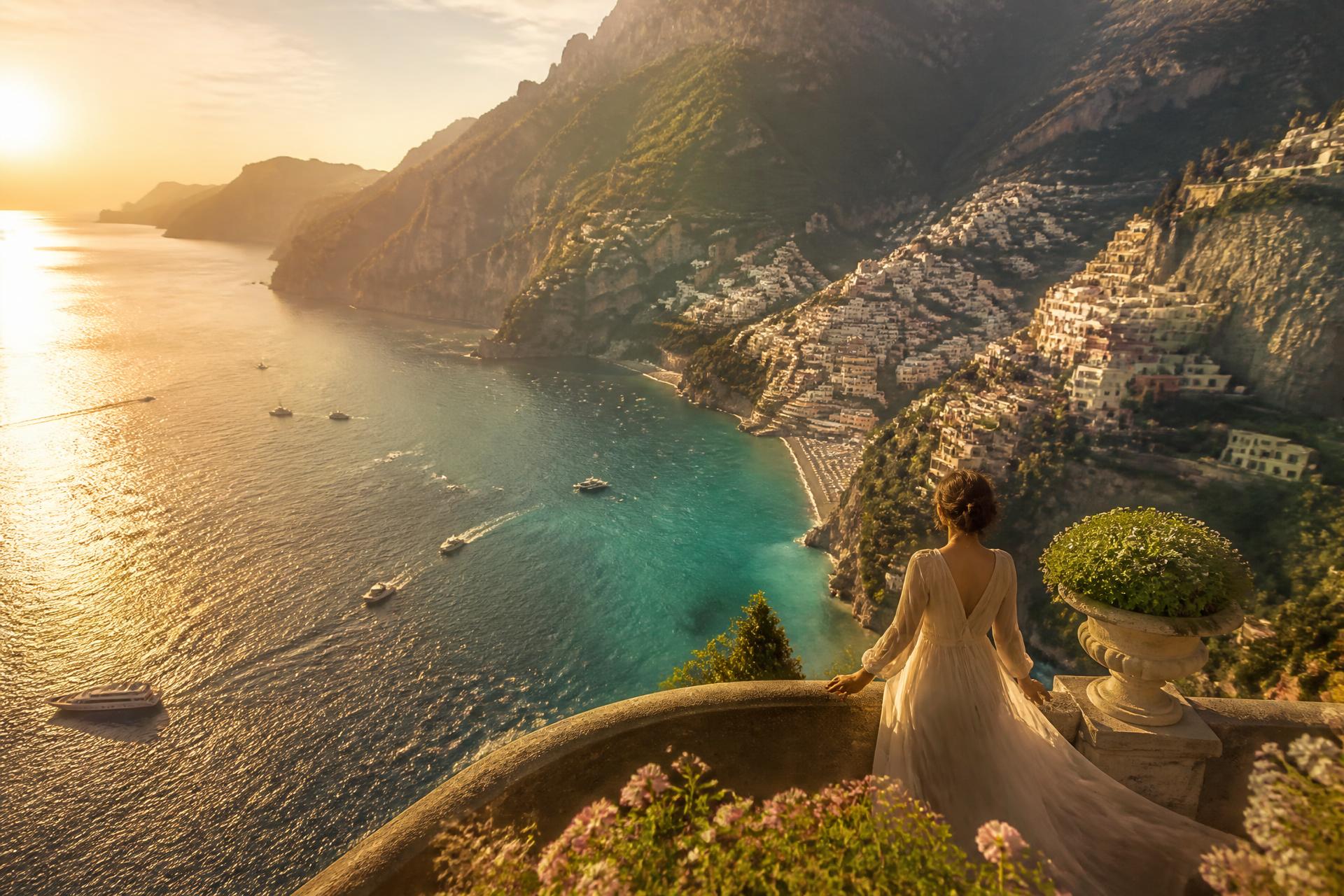 A cliffside terrace above the sea at golden hour